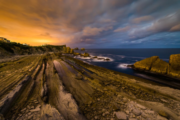 Dramatic view of Playa de la Arnia, Cantabria, Spain.
