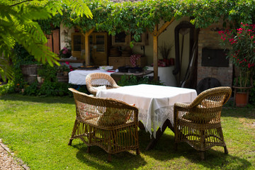 garden chair and table stand in the garden for relax
