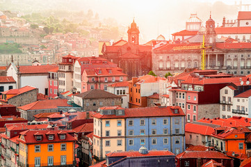 Obraz premium Porto, Portugal suny old town ribeira with colorful houses, Douro river. Sunset aerial perspective landmark.