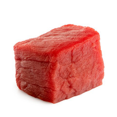 Single beef cube isolated on white.
