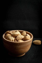 Almonds in a wooden bowl.