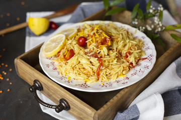 Asian dish with rice and tomato sauce