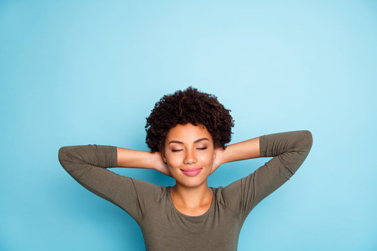 Photo of cheerful casual beautiful cute nice facinating charming black youngster enjoying her vacation sleeping much isolated over blue vivid color background