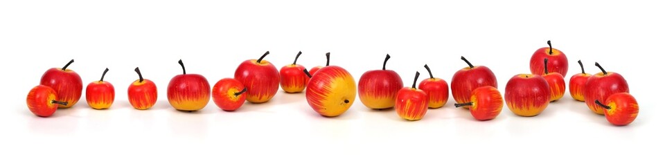 Toys in the form of apples for Christmas isolated on white background