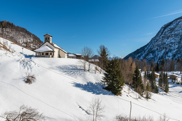 Small high mountain communities. Lateis winter. Sauris. Italy