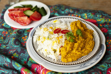 Close-up indian food with rice and tomatoes