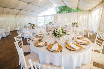 Luxury wedding table decoration. Special event table set up. Fresh flower decoration.