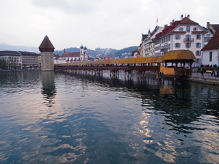 Chapel Bridge and Water Tower. Popular touristic and travel location in Luzern - Switzerland