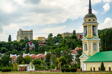 Obraz premium Voronezh, Russia, June 11, 2019. View of Assumption Church of Admiralty on Admiralteyskaya Square. Domes are crowned with golden crosses. Oldest preserved church in Voronezh. Place for text.