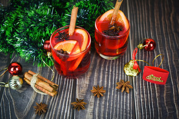 red mulled wine glasses decorated table - Christmas mulled wine delicious holiday like parties with orange cinnamon star anise spices for traditional christmas drinks winter holidays