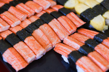 Sushi menu set Japanese cuisine fresh ingredients on tray - Japanese food sushi crab stick with...