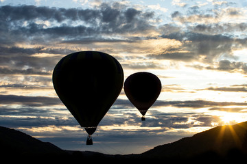 Hot air balloon over blue sky.