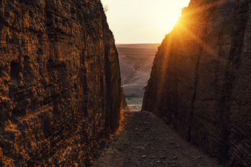Narrow road between the rocks, way to paradise