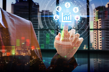 Businessman touch network using currency icon technology with virtual screen icons, Investment Financial Technology