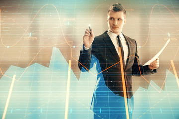 Businessman and forex graph hologram. Double exposure. Concept of financial education and analysis