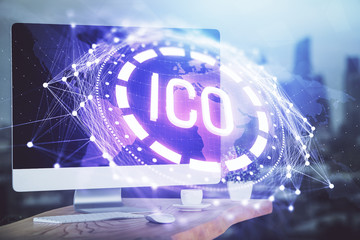 Multi exposure of blockchain theme hologram and table with computer background. Concept of bitcoin...