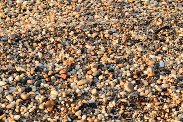 Rock textures, boulders and waves on the shore in Cartagena, Spain