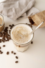 High view of coffee glass and milk