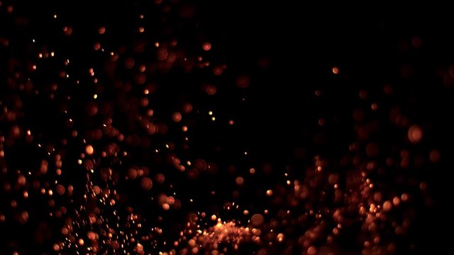 Super slow motion of fire sparks isolated on black background. Filmed on high speed camera, 1000 fps