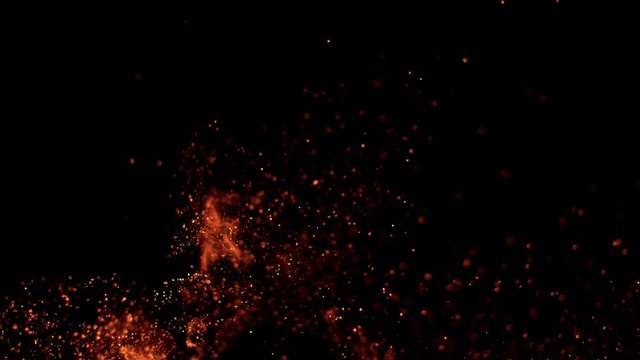 Super slow motion of fire sparks isolated on black background. Filmed on high speed camera, 1000 fps