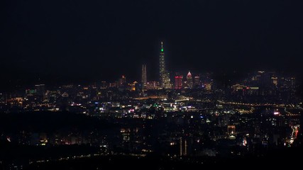 TAIPEI, TAIWAN - CIRCA AUGUST 2019 : Aerial view of sunrise cityscape of Taipei. View around shopping and business district at Xinyi area. Time lapse shot, night to morning.