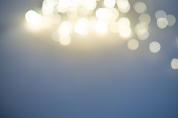 Beautiful blurred bokeh, a lot of bright artistically blurred circles. Christmas background.