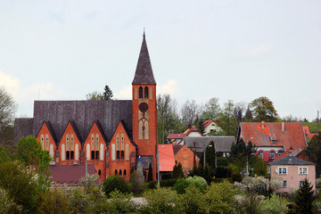 Fototapeta na wymiar St Peter and Paul Roman Catholic Church in Dubeninki, Goldap County in northern Poland.