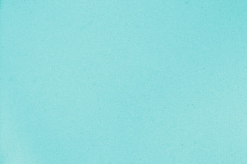 Close-up shot of pastel light blue paper pattern for background. Texture with fibers