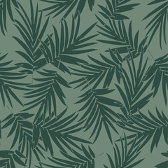 Fototapeta premium Tropical seamless pattern with palm leaves on green backdrop. Seamless green and white botanical backdrop. vector illustration.