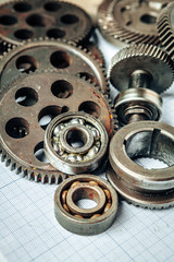 Obraz premium Car parts on graph paper for car engineering
