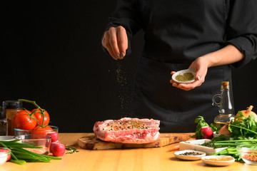 Preparation and cooking of pork ribs by a chef for grill