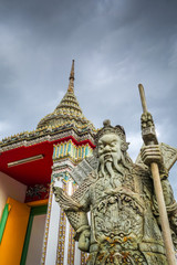 Fototapeta premium Chinese Guard statue in Wat Pho, Bangkok, Thailand