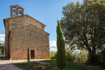 Fototapeta premium Facade of the church of Santa Caterina, a place of Catholic worship located at the western end of the built-up area Pienza, in Tuscany, Italy.