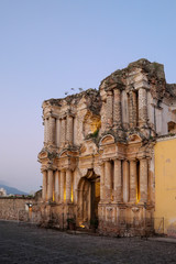 Fototapeta premium Gorgeous Guatemala - Day and night walking tour around the streets of UNESCO world heritage site Antigua - beautiful scenery, old buildings, preservation, sunrise, sunset, dusk, bright colours