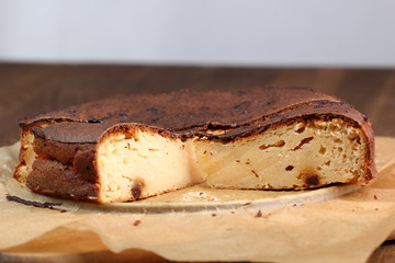 Slicing Cheesecake with raisins - freshly baked