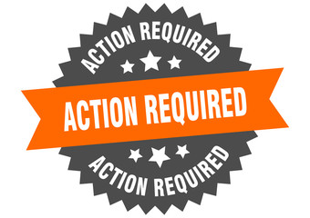 action required sign. action required orange-black circular band label