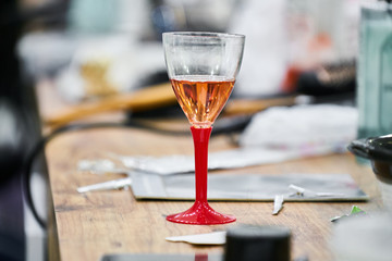 a glass of champagne on the table