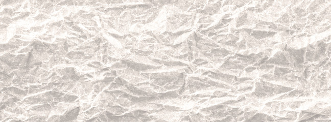Background white crumpled paper panorama. View from above.