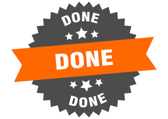 done sign. done orange-black circular band label