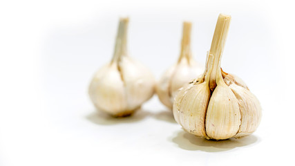 Isolated close up fresh garlic cloves
