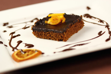 Chocolate brownie with candied orange zest
