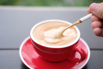 cup of coffee on wooden table