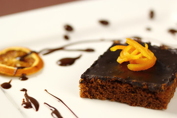 Chocolate brownie with candied orange zest