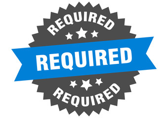 required sign. required blue-black circular band label