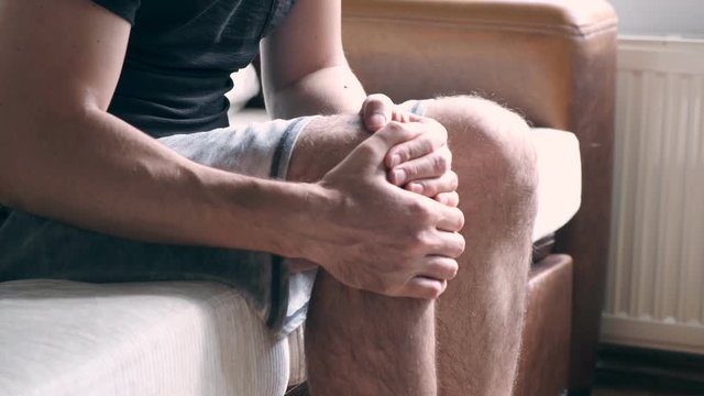 Man having terrible knee pain