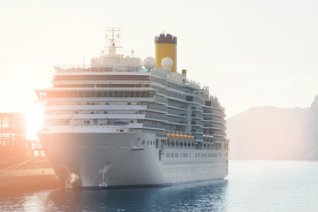 Big modern white cruise ship liner morred with mooring cable port of sea or ocean at beautiful morning sunrise time. Travel and vacation. Adventure journey beginning concept © Kyryl Gorlov
