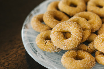 plate of sweet salted cookies on wooden floor.