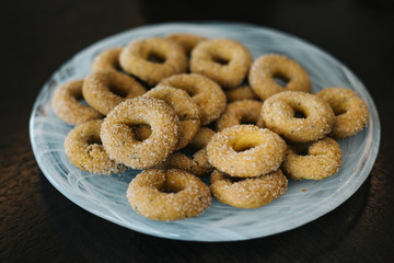 plate of sweet salted cookies on wooden floor.