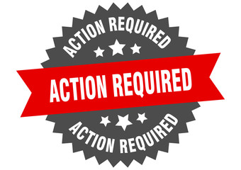 action required sign. action required red-black circular band label