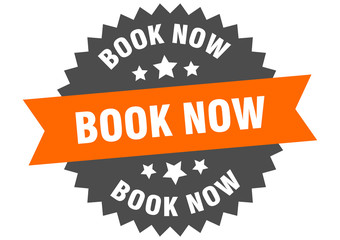 Fototapeta premium book now sign. book now orange-black circular band label